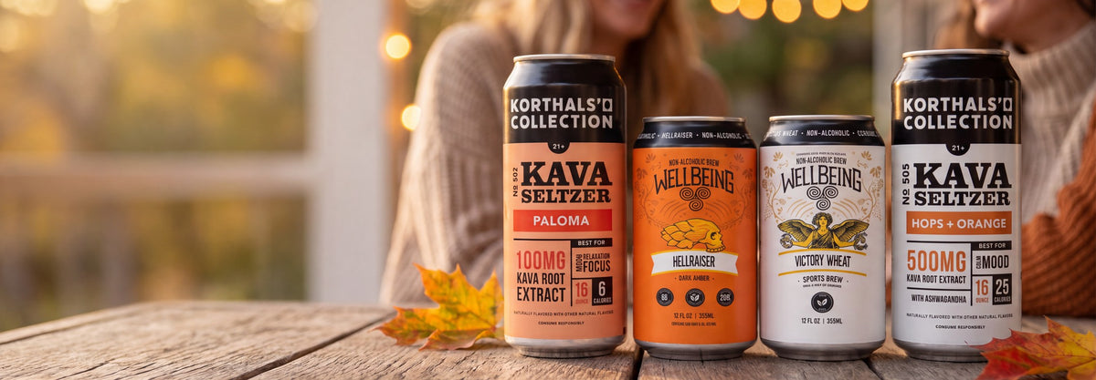 Korthals' Collection kava seltzers and WellBeing non-alcoholic brews on a porch table at golden hour